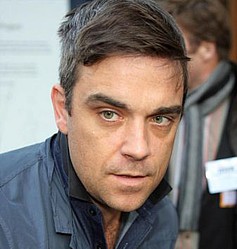 Robbie Williams said those who don`t make it in showbiz have sometimes `been let off lightly`