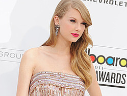 Taylor Swift Says 2012 Album Is &#039;About Moving On&#039;