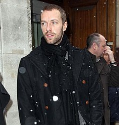 Chris Martin `explains Coldplay uniform`