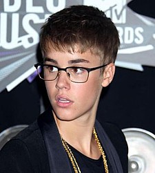 Justin Bieber cost toy doll makers $100,000 when he cut his hair