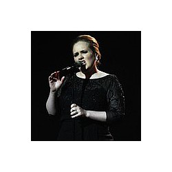 Adele unsure about happy songs