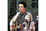 Billie Joe Armstrong: I regret my mullet - Billie Joe Armstrong plays his own songs on guitars before buying them. &hellip;