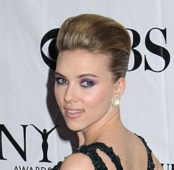 Scarlett Johansson: `I looked like a disco ball in the 90s`