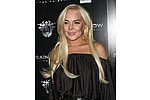 `Lindsay Lohan is one of the most stunning actresses`: rep - The 25-year-old appeared to have a mouth full of yellowing chompers as she posed on the red carpet &hellip;