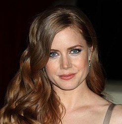 Amy Adams: `Pregnancy left me with a muffin top`