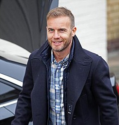 Gary Barlow: `Take That will continue without Robbie Williams`