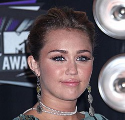 Miley Cyrus hits back at online critics calling her fat