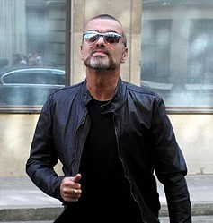 George Michael `on the mend` say doctors