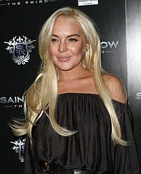 Lindsay Lohan says she must learn from her mistakes