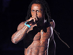 Lil Wayne Disses Jay-Z, Kanye In Pre-Grammy Freestyle