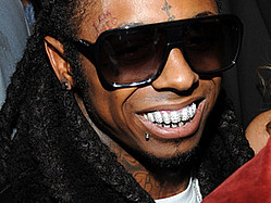 Lil Wayne Signs Four-Album Deal With Cash Money Records