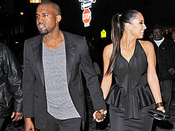 Kim Kardashian, Kanye West Snuggle Up At Dinner Parties