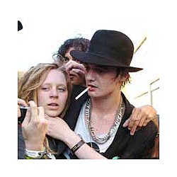 Pete Doherty says Kate Moss smashed a guitar on his head
