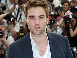 Robert Pattinson Denies He&#039;s &#039;Catching Fire&#039; In &#039;Hunger Games&#039; Franchise