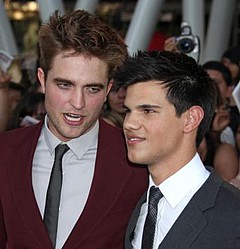Robert Pattinson said abs comparisons between him and Taylor Lautner are `unfair`