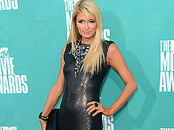 Paris Hilton Adds Snoop Dogg, Flo Rida To Electropop Album