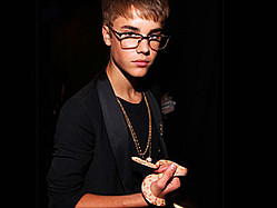 Justin Bieber Auctioning Off His Snake For Charity