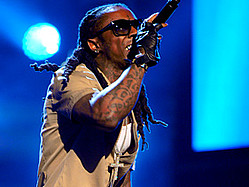 Lil Wayne Breaks Elvis&#039; Billboard Record