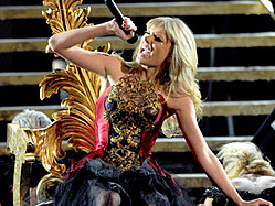 Taylor Swift Strikes AMA Stage With Chaotic Masquerade