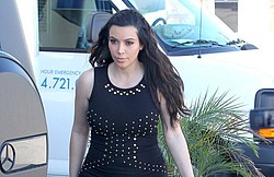 Kim Kardashian shuns maternity wear