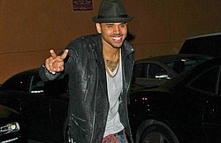 Chris Brown taking Rihanna romance slowly
