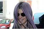 Kelly Osbourne is contractually obliged to have purple hair - Kelly Osbourne has to keep her hair purple for two years. The &#039;Fashion Police&#039; star admitted she &hellip;