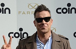 Robbie Williams&#039; burial dilemma