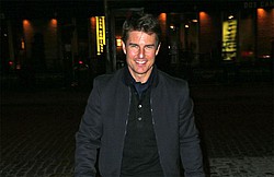 Tom Cruise signs fans&#039; breasts