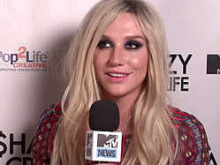 Ke$ha Promises Positivity, Partying This Summer With Pitbull