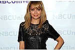 Nicole Richie wants &#039;tramp stamp&#039; tattoo removed - Nicole Richie wants to remove her &#039;butt crack cross&#039; tattoo. The &#039;Fashion Star&#039; mentor is &hellip;