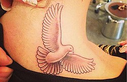 Rita Ora gets dove tattoo