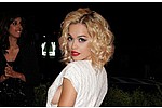 Rita Ora caught again in Met Ball gown - Rita Ora was spotted wearing the same outfit with a mystery man the day after the Met Ball. &hellip;